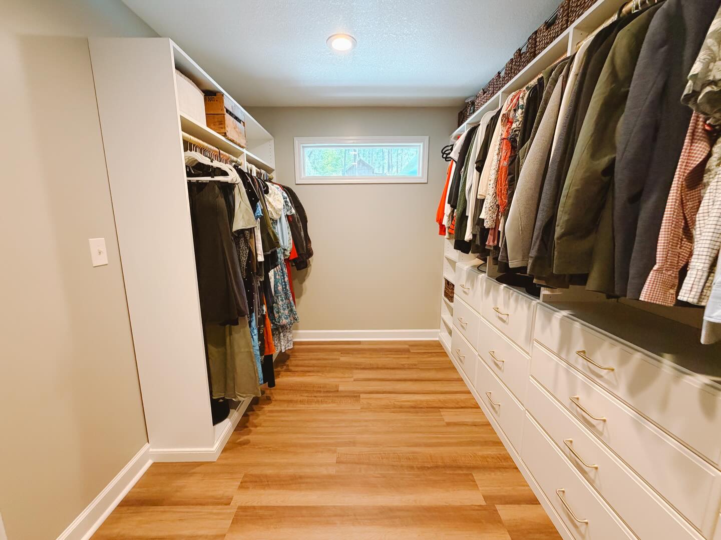 Large walk-in closet with drawers